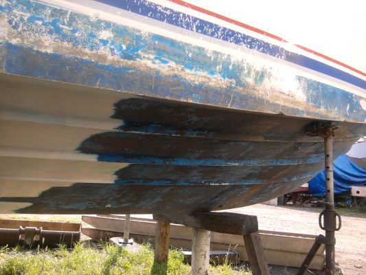 Décapage par aérogommage d'un antifouling de bateau en Normandie